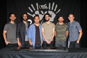 LOS ANGELES, JUN 18 -  Linkin Park, Mike Shinoda, Rob Bourdon, Joe Hahn, Brad Delson, Dave Farrell, Chester Bennington at the Linkin Park Rockwalk Inducting Ceremony at the Guitar Center on June 18, 2014 in Los Angeles, CA photo