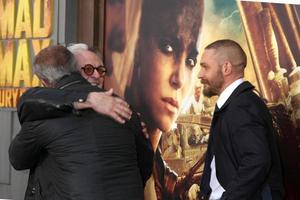 LOS ANGELES, MAY 7 - George Miller, Tom Hardy, Mel Gibson at the Mad Max - Fury Road Los Angeles Premiere at the TCL Chinese Theater IMAX on May 7, 2015 in Los Angeles, CA photo