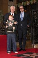 LOS ANGELES, MAR 16 - Malcolm McDowell, son Beckett McDowell, Gary Oldman at the Malcolm McDowell Walk of Fame Star Ceremony for The Muppets at the Hollywood Boulevard on March 16, 2012 in Los Angeles, CA photo