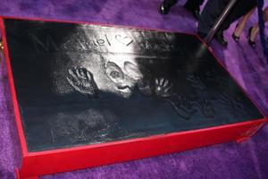 LOS ANGELES, JAN 26 - Michael Jackson Hand and Footprints, and his children s handprints at the Michael Jackson Immortalized Handprint and Footprint Ceremony at Graumans Chinese Theater on January 26, 2012 in Los Angeles, CA photo