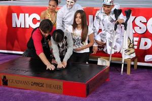 LOS ANGELES, JAN 26 - Prince Michael Jackson, Prince Michael Jackson, II aka Blanket Jackson, Paris Jackson at the Michael Jackson Immortalized Handprint and Footprint Ceremony at Graumans Chinese Theater on January 26, 2012 in Los Angeles, CA photo