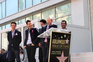 LOS ANGELES, OCT 9 - New Kids On The Block, Jordan Knight, Donnie Wahlberg, Joe McIntyre, Danny Wood, Jonathan Knight at the New Kids On the Block Hollywood Walk of Fame Star Ceremony at Hollywood Boulevard on October 9, 2014 in Los Angeles, CA photo