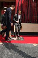 LOS ANGELES, SEP 15 - Jason Segal, Neil Patrick Harris, Joss Wheden at the ceremony bestowing a star on the Hollywood Walk of Fame to Neil Patrick Harris at Frolic Room on September 15, 2011 in Los Angeles, CA photo