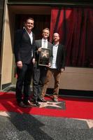 LOS ANGELES, SEP 15 - Jason Segal, Neil Patrick Harris, Joss Wheden at the ceremony bestowing a star on the Hollywood Walk of Fame to Neil Patrick Harris at Frolic Room on September 15, 2011 in Los Angeles, CA photo