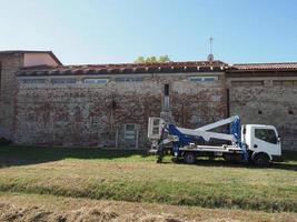 roof repairment with hydraulic crane photo