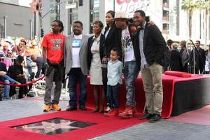 LOS ANGELES, DEC 4 - Helen Lasichanh, Rocket Ayer Williams, Pharrell Williams, Family at the Pharrell Williams Hollywood Walk of Fame Star Ceremony at the W Hotel Hollywood on December 4, 2014 in Los Angeles, CA photo