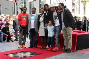 LOS ANGELES, DEC 4 - Helen Lasichanh, Rocket Ayer Williams, Pharrell Williams, Family at the Pharrell Williams Hollywood Walk of Fame Star Ceremony at the W Hotel Hollywood on December 4, 2014 in Los Angeles, CA photo