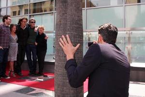 LOS ANGELES, MAY 9 - Rick Springfield, Michael Springthorpe, family being photographed by Jason Thompson at the Rick Springfield Hollywood Walk of Fame Star Ceremony at Hollywood Blvd on May 9, 2014 in Los Angeles, CA photo
