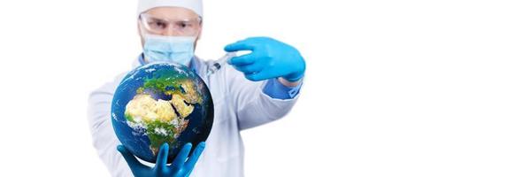 Doctor hold a earth globe in hands and a medical syringe with vaccine against corona virus. 3D rendering. Elements of this image furnished by NASA. photo