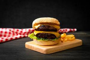 hamburger or beef burgers with cheese and french fries photo