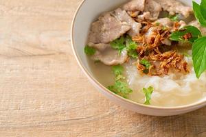 Pho Bo vietnamese soup with pork and rice noodles photo