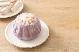 taro bun with white sugar cream and nut photo