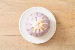 taro bun with white sugar cream and nut photo