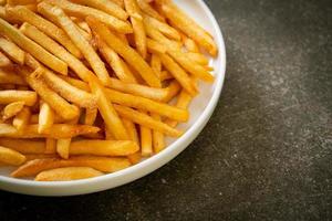 French fries with sour cream and ketchup photo