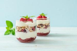 fresh raspberry and yogurt with granola photo