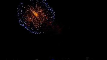 Colorful bright fireworks showin the night sky at City day festival, Novosibirsk, Russia video