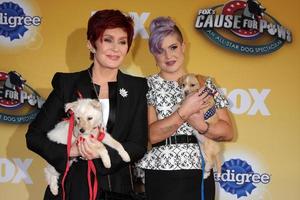 LOS ANGELES, NOV 22 - Sharon Osbourne, Kelly Osbourne at the FOX s Cause for Paws - All-Star Dog Spectacular at the Barker Hanger on November 22, 2014 in Santa Monica, CA photo