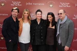 LOS ANGELES, MAR 13 - L-R Actor Patrick Dempsey, wife Jillian Demspey, singer K D Lang, Joyce Varvatos and designer John Varvatos arriving at the John Varvatos 8th Annual Stuart House Benefit at John Varvaots Store on March 13, 2011 in Los Angeles, CA photo