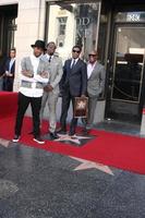 LOS ANGELES, OCT 10 - Usher, Sean Combs, Kenny Babyface Edmonds, Antonio LA Reid at the Kenny Babyface Edmonds Hollywood Walk of Fame Star Ceremony at Hollywood Boulevard on October 10, 2013 in Los Angeles, CA photo