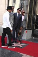 LOS ANGELES, OCT 10 - Usher, Sean Combs, Kenny Babyface Edmonds, Antonio LA Reid at the Kenny Babyface Edmonds Hollywood Walk of Fame Star Ceremony at Hollywood Boulevard on October 10, 2013 in Los Angeles, CA photo