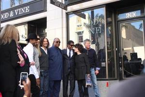 LOS ANGELES, OCT 10 - Usher, Colbie Caillat, Kenny G, Stevie Wonder, Kenny Babyface Edmonds, Carole Bayer Sager, David Foster at the Kenny Babyface Edmonds Hollywood Walk of Fame Star Ceremony at Hollywood Boulevard on October 10, 2013 in Los Angeles, CA photo