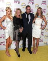 LOS ANGELES, MAY 17 - Paris Hilton, Kathy Hilton, Rick Hilton and Nicky Hilton arriving at the premiere of Oxygen s New Docu-Series The World According To Paris  at Tropicana Bar at The Hollywood Roosevelt on May 17, 2011 in Los Angeles, CA photo