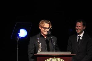 LOS ANGELES, FEB 15 -  Johnny Depp receives the Distinguished Artisan Award at the at the Annual Make-Up Artists And Hair Stylists Guild Awards at Paramount Theater on February 15, 2014 in Los Angeles, CA photo