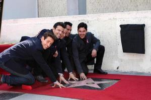 LOS ANGELES, OCT 9 -  New Kids On The Block, Jordan Knight, Donnie Wahlberg, Joe McIntyre, Danny Wood, Jonathan Knight at the New Kids On the Block Hollywood Walk of Fame Star Ceremony at Hollywood Boulevard on October 9, 2014 in Los Angeles, CA photo