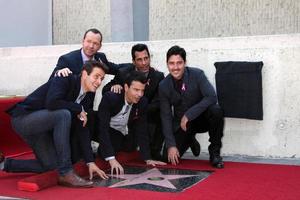 LOS ANGELES, OCT 9 -  New Kids On The Block, Jordan Knight, Donnie Wahlberg, Joe McIntyre, Danny Wood, Jonathan Knight at the New Kids On the Block Hollywood Walk of Fame Star Ceremony at Hollywood Boulevard on October 9, 2014 in Los Angeles, CA photo