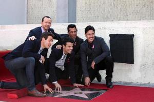 LOS ANGELES, OCT 9 -  New Kids On The Block, Jordan Knight, Donnie Wahlberg, Joe McIntyre, Danny Wood, Jonathan Knight at the New Kids On the Block Hollywood Walk of Fame Star Ceremony at Hollywood Boulevard on October 9, 2014 in Los Angeles, CA photo