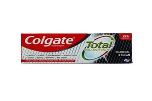 TERNOPIL, UKRAINE - JUNE 23, 2022 Colgate toothpaste, a brand of oral hygiene products manufactured by American consumer-goods company Colgate-Palmolive photo