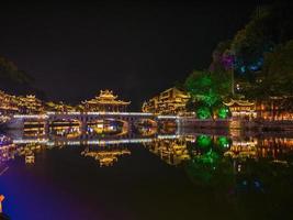 Scenery view in the night of fenghuang old town .phoenix ancient town or Fenghuang County is a county of Hunan Province, China photo