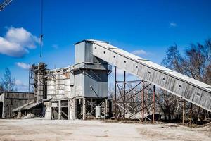 Old abandoned factory of reinforced concrete. photo