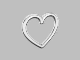 Toy metal heart. Symbol of love. Silver single color. On a gray monochrome background. View left side. 3d rendering. photo