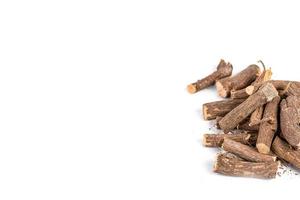 Ayurvedic Mulethi or Liquorice root stick or jeshthamadh on white background photo