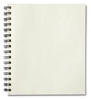 blank spiral notebook isolated on white background photo
