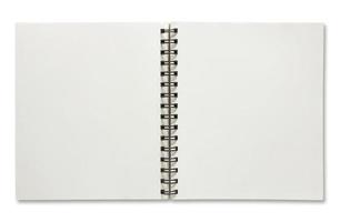 open spiral notebook isolated on white background photo