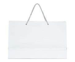 White paper shopping bag isolated on white with clipping path photo