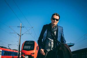 Businessman on train station. photo