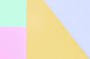 Texture background of fashion pastel colors. Pink, violet, orange and blue geometric pattern papers. photo