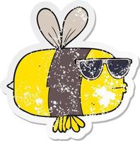 retro distressed sticker of a cartoon bee wearing sunglasses vector