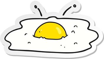 pegatina de un huevo frito de dibujos animados vector