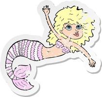 retro distressed sticker of a cartoon pretty mermaid waving vector