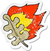 retro distressed sticker of a cartoon burning dry leaf vector