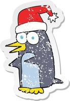 pegatina retro angustiada de un pingüino navideño de dibujos animados vector