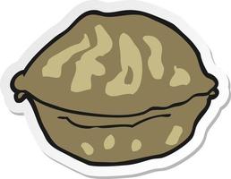 sticker of a cartoon walnut in shell vector