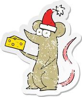 retro distressed sticker of a cartoon christmas mouse with cheese vector