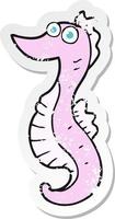 retro distressed sticker of a cartoon seahorse vector