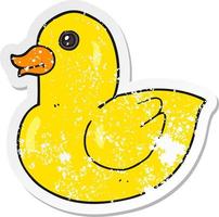 retro distressed sticker of a cartoon rubber duck vector