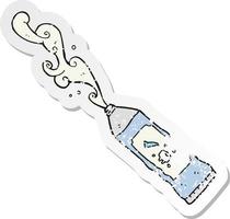 retro distressed sticker of a cartoon toothpaste squirting vector